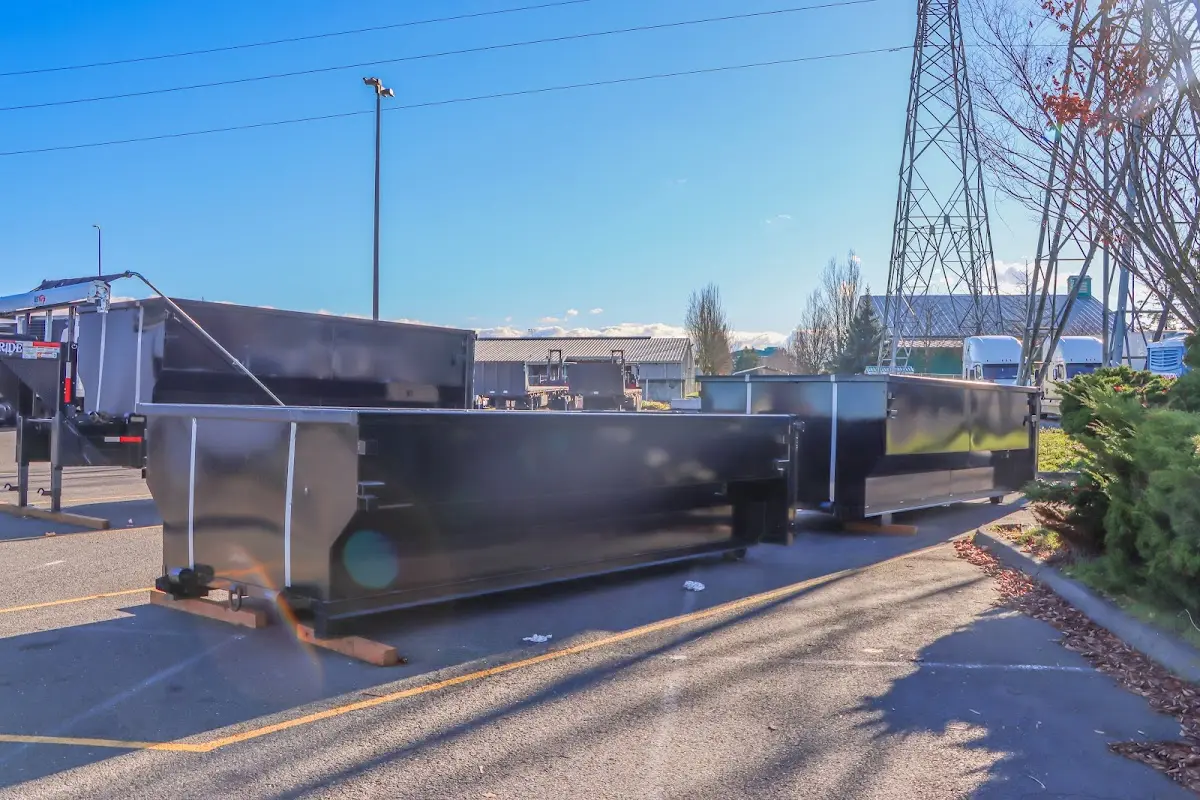 Roll-off dumpster ready for waste disposal at job site for 4 Yard Dumpster Rental in Woodbury